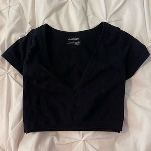 Seamless deep plunge garage tee